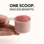 Hand holding a scoop of Blast Reds superfoods powder with text 'ONE SCOOP. ENDLESS BENEFITS.'