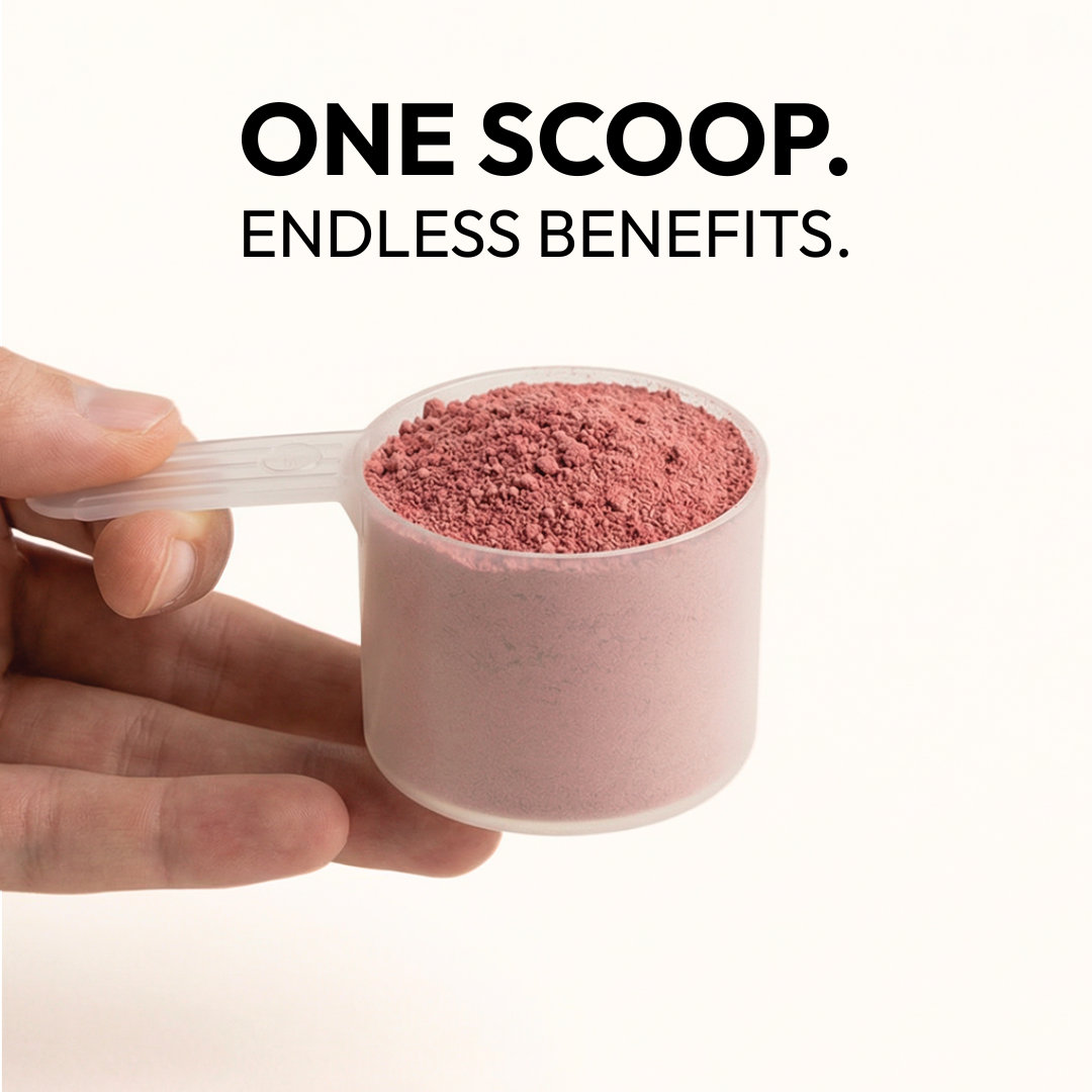 Hand holding a scoop of Blast Reds superfoods powder with text 'ONE SCOOP. ENDLESS BENEFITS.'