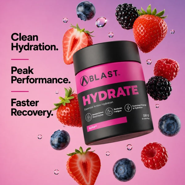 Blast Hydrate supplement container with berries on a pink background